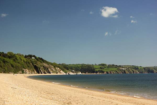 A sandy beach in Devon, England by Sylwia Nowak