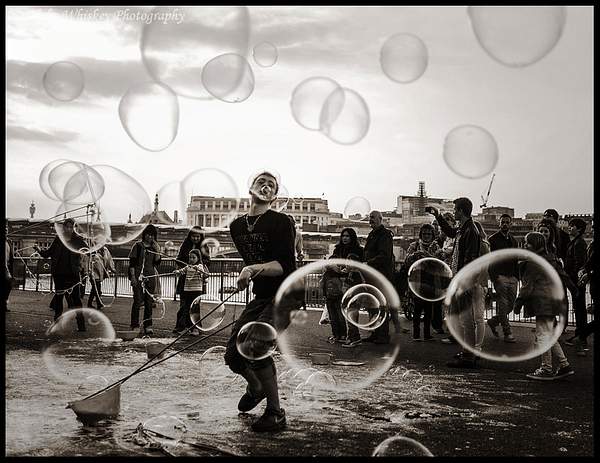 Blowing Bubbles by Alpha Whiskey Photography