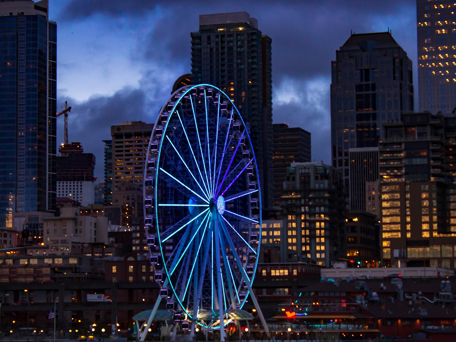 Seattle's Great Wheel and skyline at dusk.