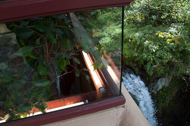 Peeking down at the waterfall from the main floor deck