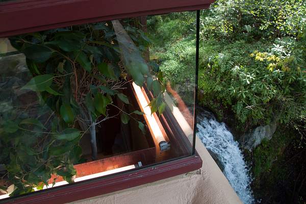 Peeking down at the waterfall from the main floor deck...