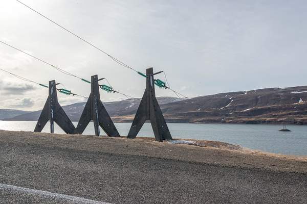 Power lines crossing Þorskafjordur by Willis Chung