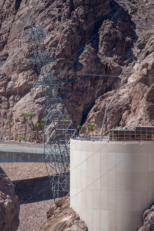 Observation area along the Nevada side of the dam with canted power line pylon.